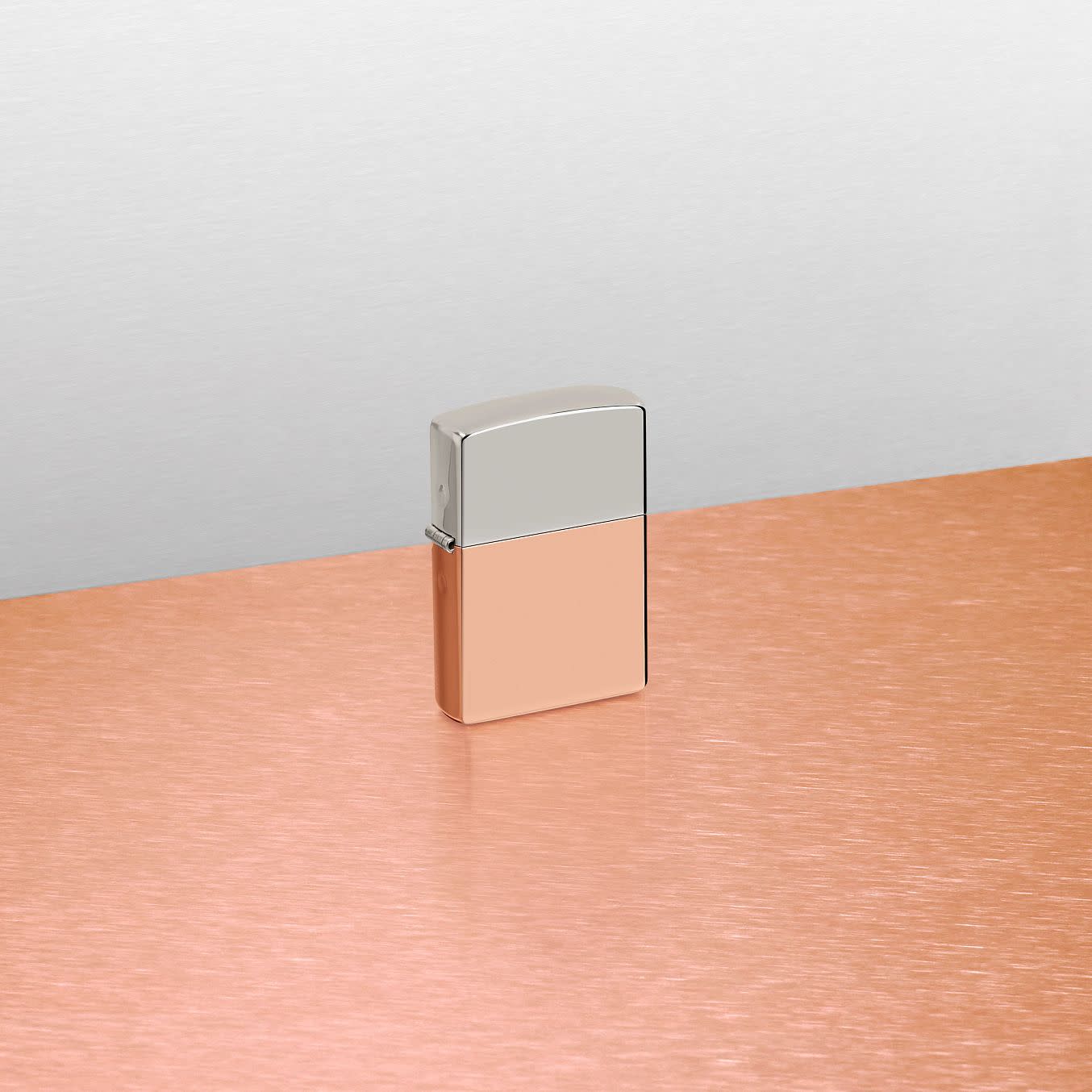 Glamour shot of Zippo Bimetal (Copper Bottom) Windproof Lighter standing in a split scene.