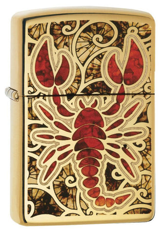 Front shot of Fusion Scorpion High Polish Brass Windproof Lighter standing at a 3/4 angle