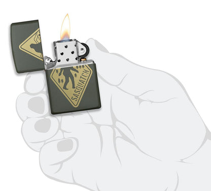 Sasquatch Crossing Windproof Lighter lit in hand