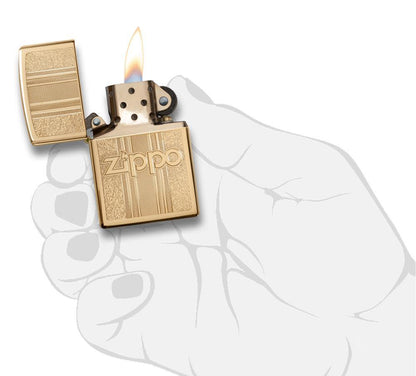 Front view of the Zippo and Pattern Design in hand, open and lit