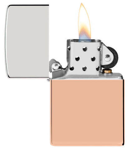 Zippo Bimetal (Copper Bottom) Windproof Lighter with its lid open and lit.