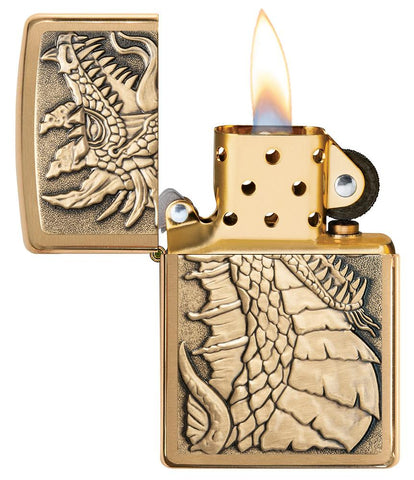 Dragon Emblem Design Brushed Brass Windproof Lighter with its lid open and lit
