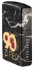 Angled shot of 90th Anniversary "Everyday" Piece Windproof Lighter, showing the front emblem and engraving on the right side.