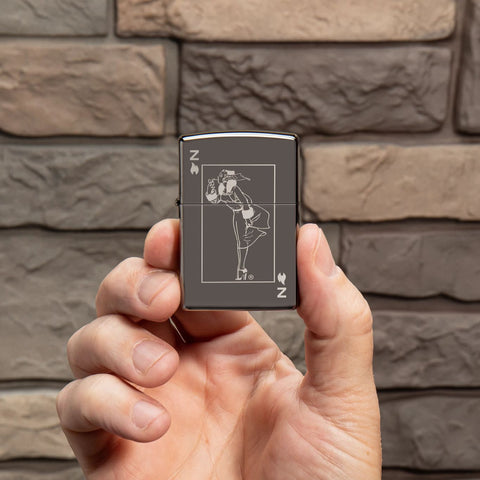 Lifestyle image of Windy Design Card Black Ice® Windproof Lighter in hand.