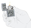 Dragon Emblem Design Street Chrome™ Windproof Lighter lit in hand